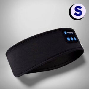 Sömnis svart sovmask med mjukt tyg - studio bild med grå bakgrund.